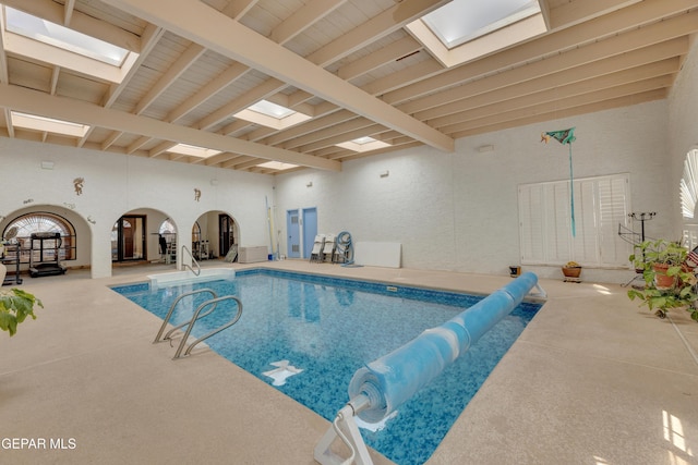 pool featuring a skylight