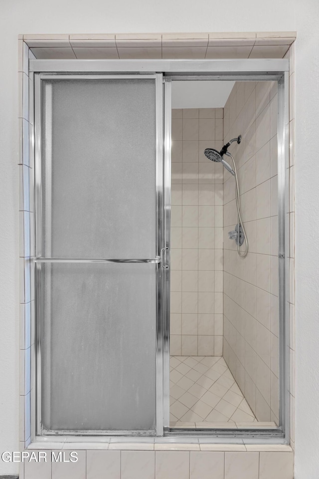 bathroom featuring a stall shower