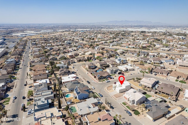 birds eye view of property with a residential view