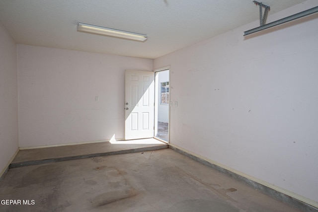 garage with baseboards