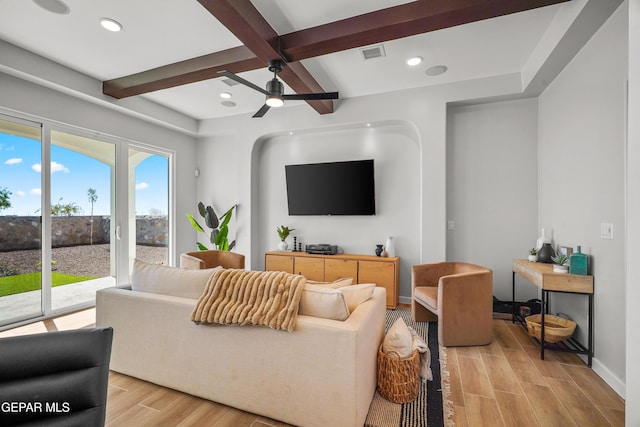 living area with beamed ceiling, recessed lighting, visible vents, and wood tiled floor