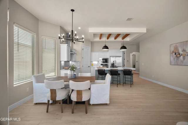 dining space with baseboards, visible vents, an inviting chandelier, arched walkways, and light wood-type flooring