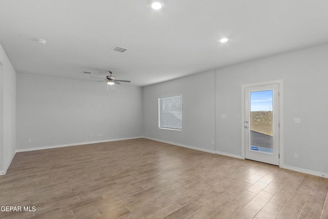 unfurnished room featuring visible vents, light wood-style flooring, recessed lighting, baseboards, and ceiling fan