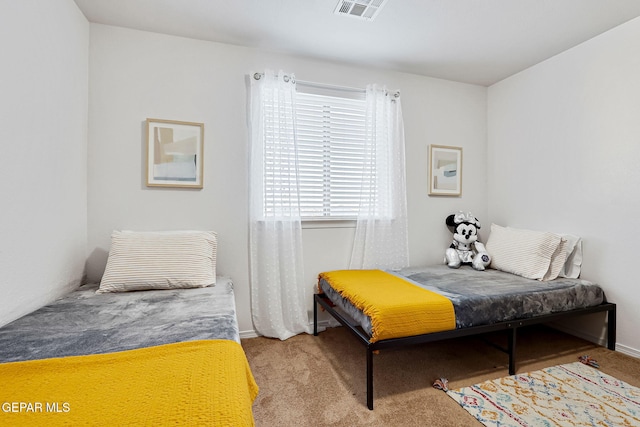 bedroom with carpet and visible vents