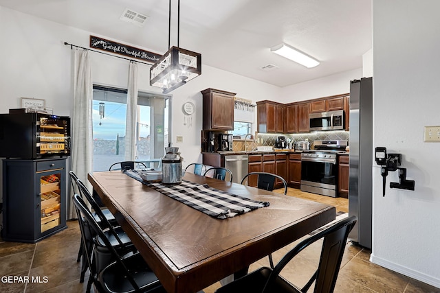 dining space with visible vents