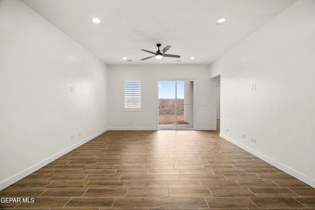 unfurnished room featuring recessed lighting, baseboards, ceiling fan, and wood tiled floor