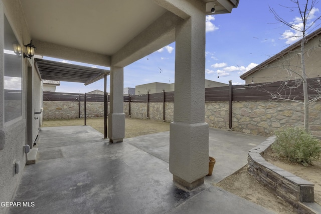 view of patio with a fenced backyard