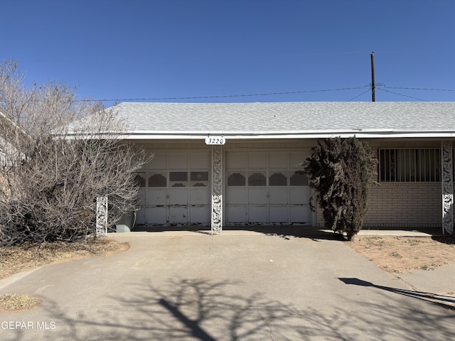 garage with driveway