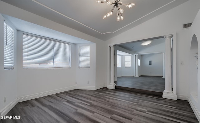 unfurnished room with visible vents, ornate columns, dark wood finished floors, lofted ceiling, and arched walkways