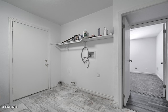 laundry room with laundry area, hookup for a gas dryer, baseboards, and washer hookup