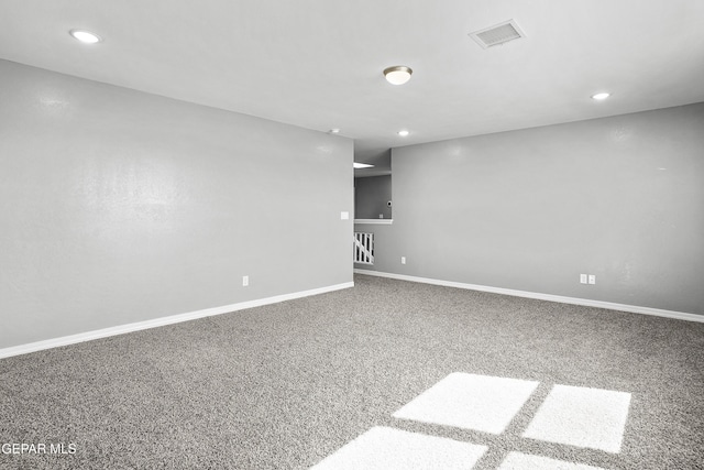 spare room featuring recessed lighting, visible vents, baseboards, and carpet floors