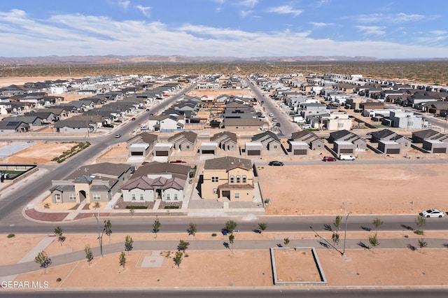 aerial view with a mountain view and a residential view