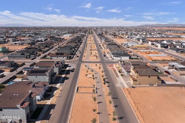 drone / aerial view with a mountain view and a residential view