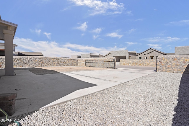 exterior space with a patio and fence