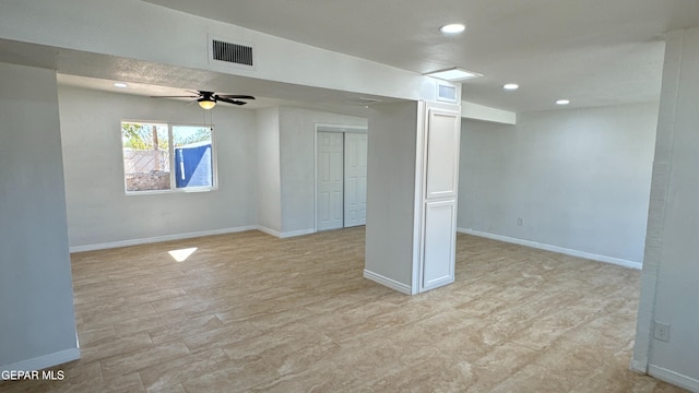 below grade area featuring a ceiling fan, recessed lighting, visible vents, and baseboards