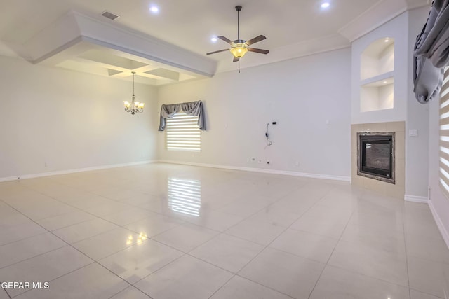 unfurnished living room with beam ceiling, coffered ceiling, light tile patterned floors, baseboards, and a tile fireplace