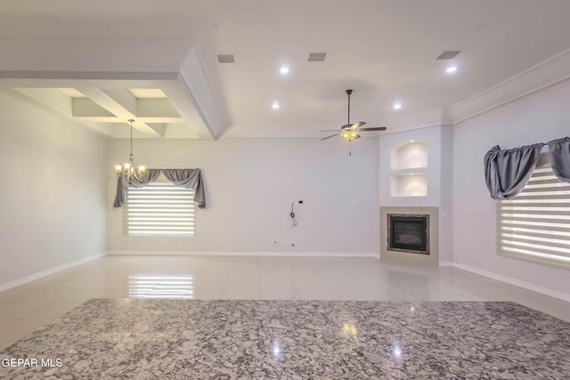 unfurnished living room with visible vents, baseboards, recessed lighting, ceiling fan with notable chandelier, and a glass covered fireplace