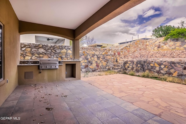 view of patio / terrace with grilling area and exterior kitchen