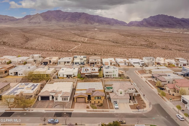 aerial view with a mountain view and a residential view