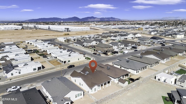 bird's eye view with a mountain view and a residential view