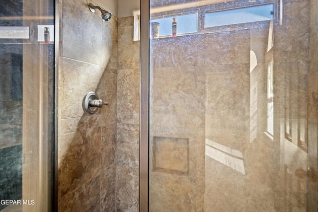 full bath featuring a stall shower