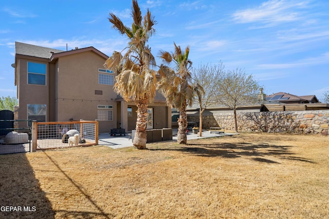 view of yard featuring a patio area and fence