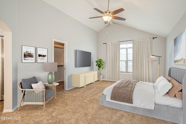 carpeted bedroom featuring lofted ceiling, baseboards, and ceiling fan