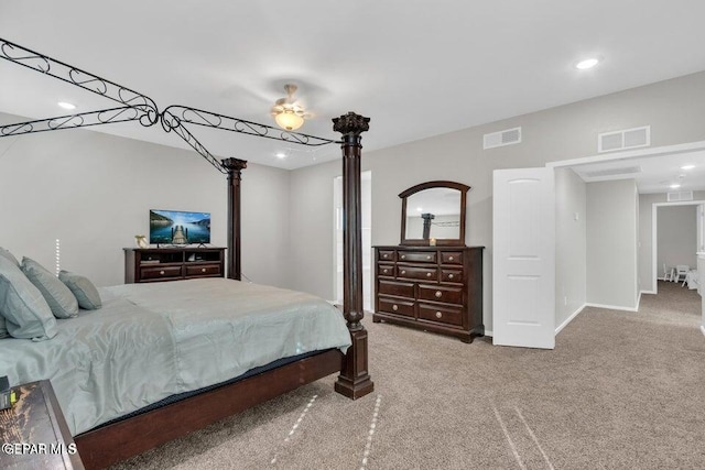 carpeted bedroom with recessed lighting, visible vents, and baseboards