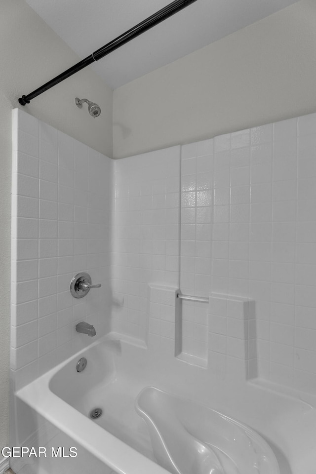 bathroom featuring washtub / shower combination