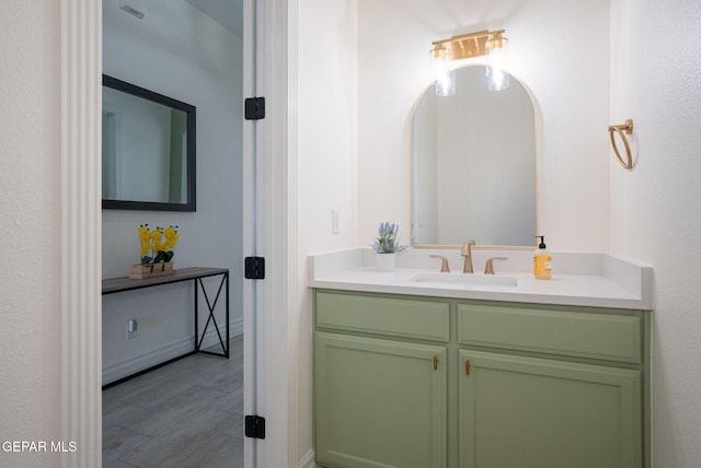 bathroom featuring vanity and wood finished floors