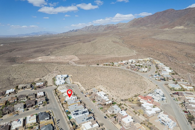 aerial view with a mountain view and a residential view