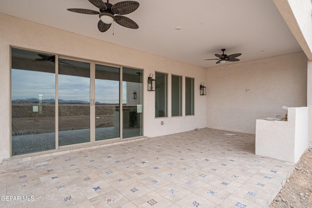 view of patio / terrace with a ceiling fan