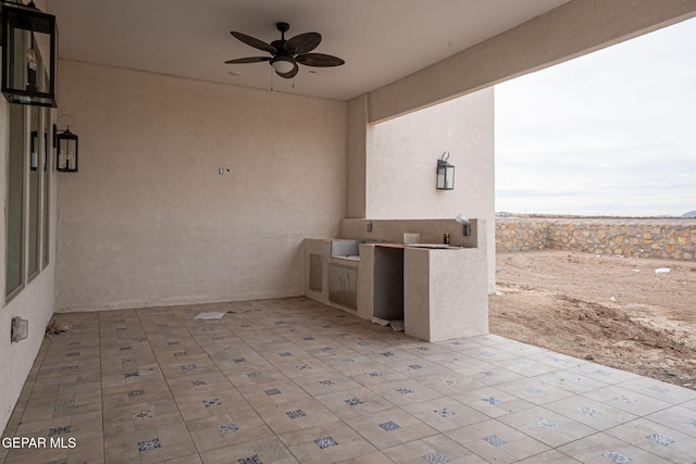 view of patio / terrace featuring a ceiling fan