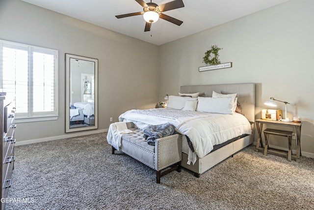 bedroom with carpet flooring, a ceiling fan, and baseboards