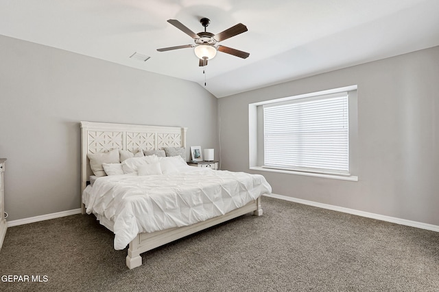 bedroom featuring vaulted ceiling, baseboards, and carpet floors