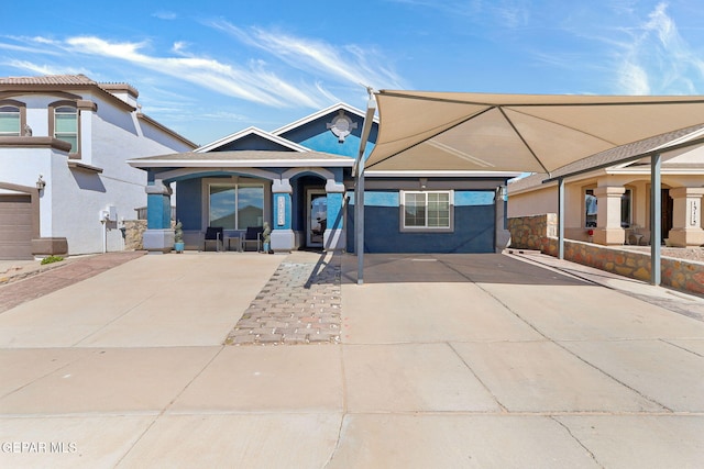 view of front of house featuring stucco siding