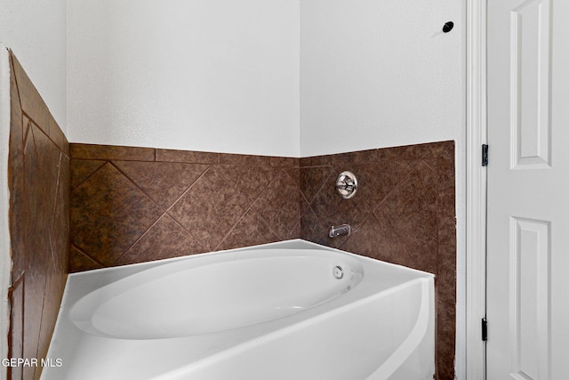 bathroom featuring a garden tub