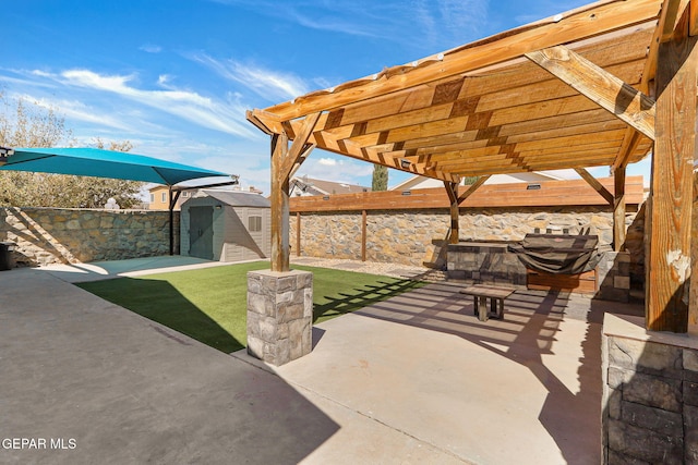 view of patio / terrace with a fenced backyard, a pergola, a storage shed, and an outdoor structure