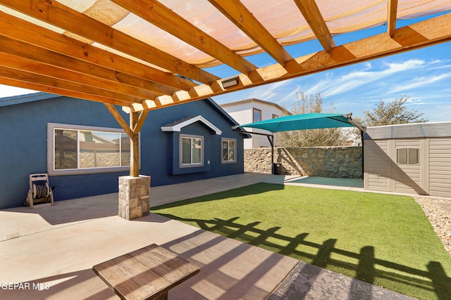 view of yard with an outbuilding, a shed, a pergola, and a patio