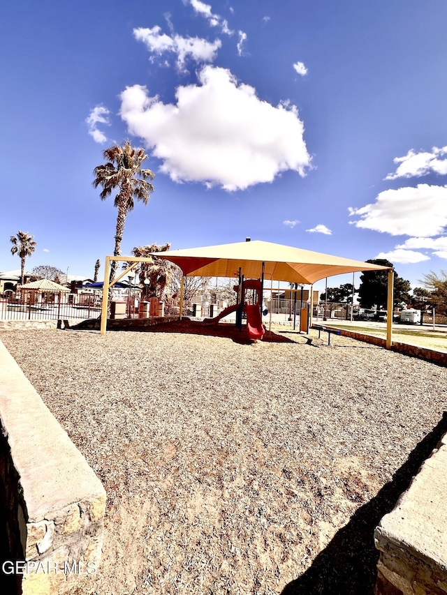 community play area featuring fence