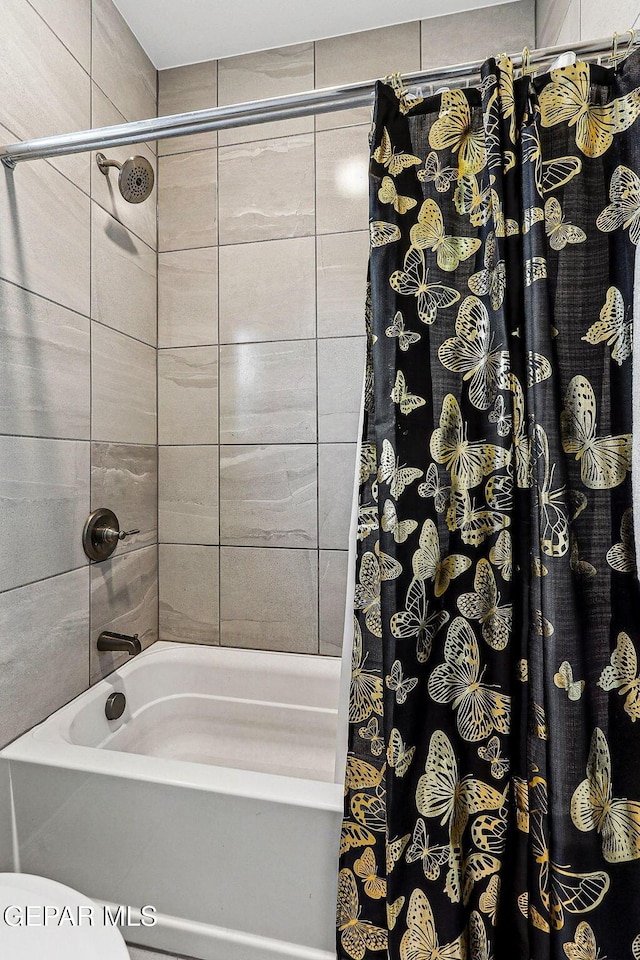 full bathroom featuring shower / bath combo