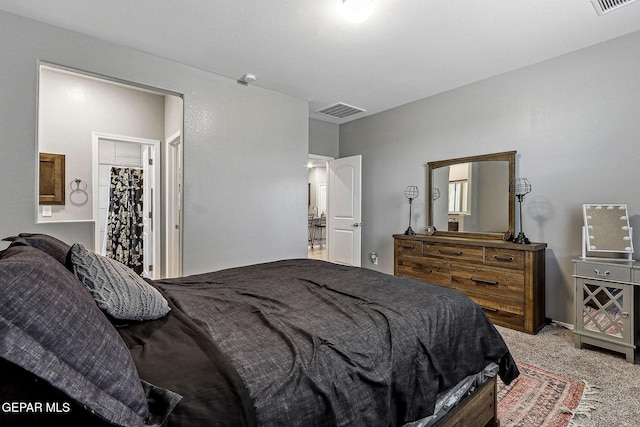 bedroom with carpet and visible vents