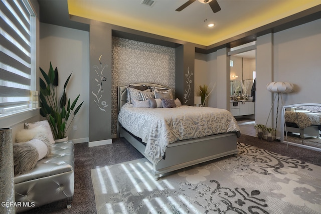 bedroom featuring granite finish floor, recessed lighting, multiple windows, and baseboards