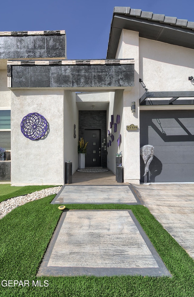 doorway to property with stucco siding