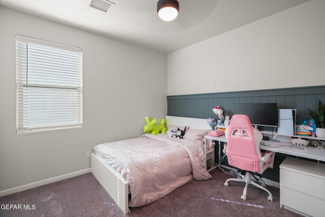 bedroom featuring visible vents, baseboards, and carpet flooring