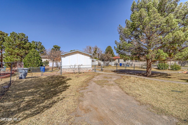 view of yard featuring a gate and fence