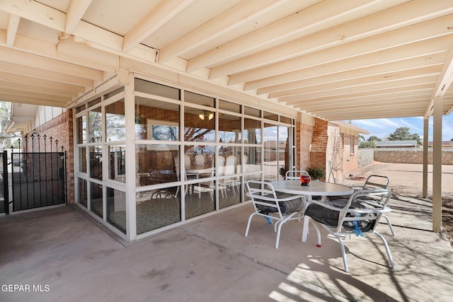 view of patio featuring outdoor dining area