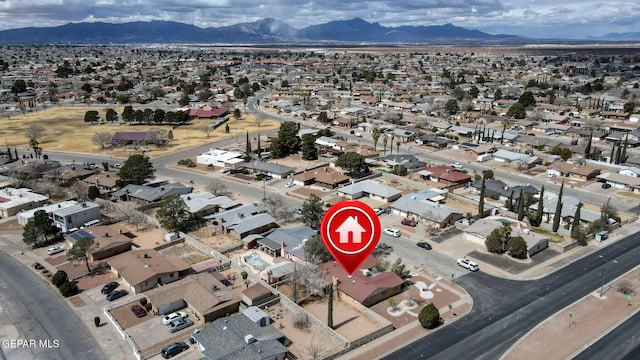 drone / aerial view with a mountain view and a residential view