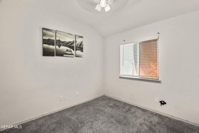 unfurnished room featuring baseboards, carpet flooring, a ceiling fan, and lofted ceiling