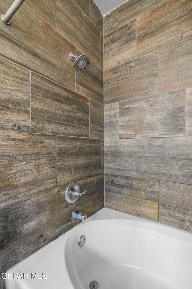 bathroom featuring tub / shower combination